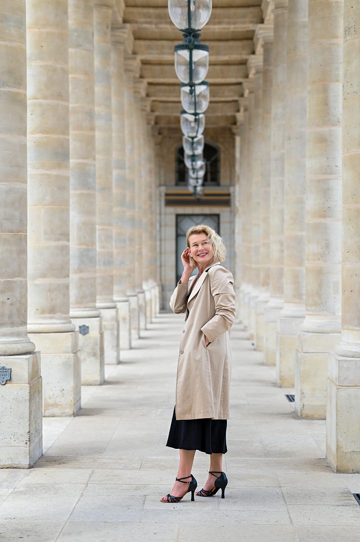 Karen Bussen stands on the street in New York City and in Paris at the Palais Royal
