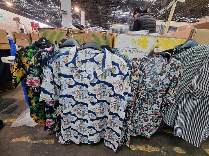 Clothing stalls Queens Market, East London