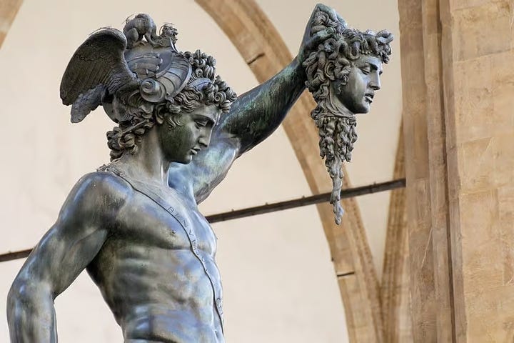 Statue of Perseus holding Medusa's decapitated head,  painting of Medusa's head.