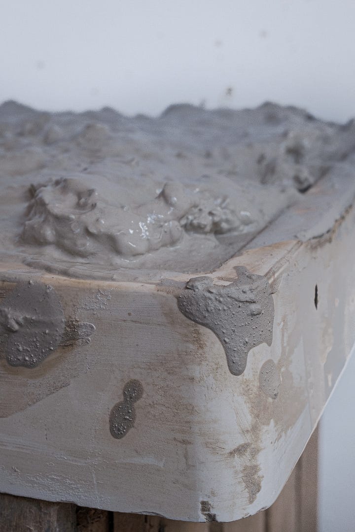 Five images of clay in varying states, ready to use, dried up slip in a pot, on a slab being recycled and curls of leather hard clay from a turned saucer