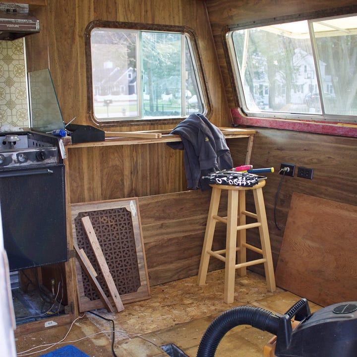 vintage trailer shown in disrepair and after renovations, painting and decorating