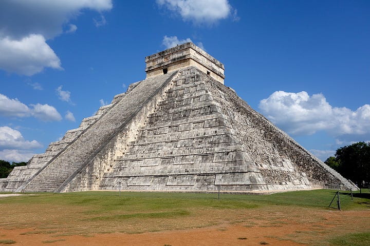  the Temple of Kukulcan', a Mesoamerican step-pyramid, and a detail of a serpent head there