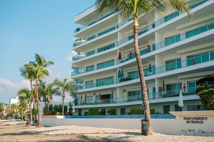 Becca and I cheers with the morning coffee,  Picture 2 infinity pool at the condo, picture 3 view of the front of the condo building from the beach, picture 4 my hat and backpack ready for the beach, 