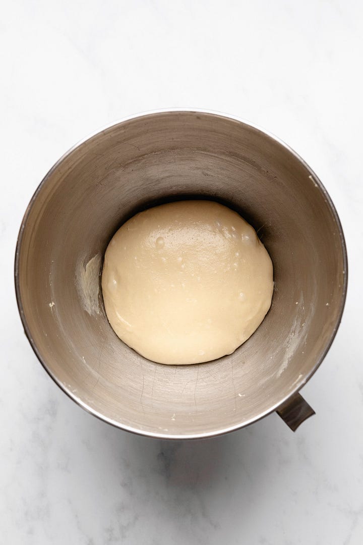 Images showing stages of kneading for vegan brioche dough