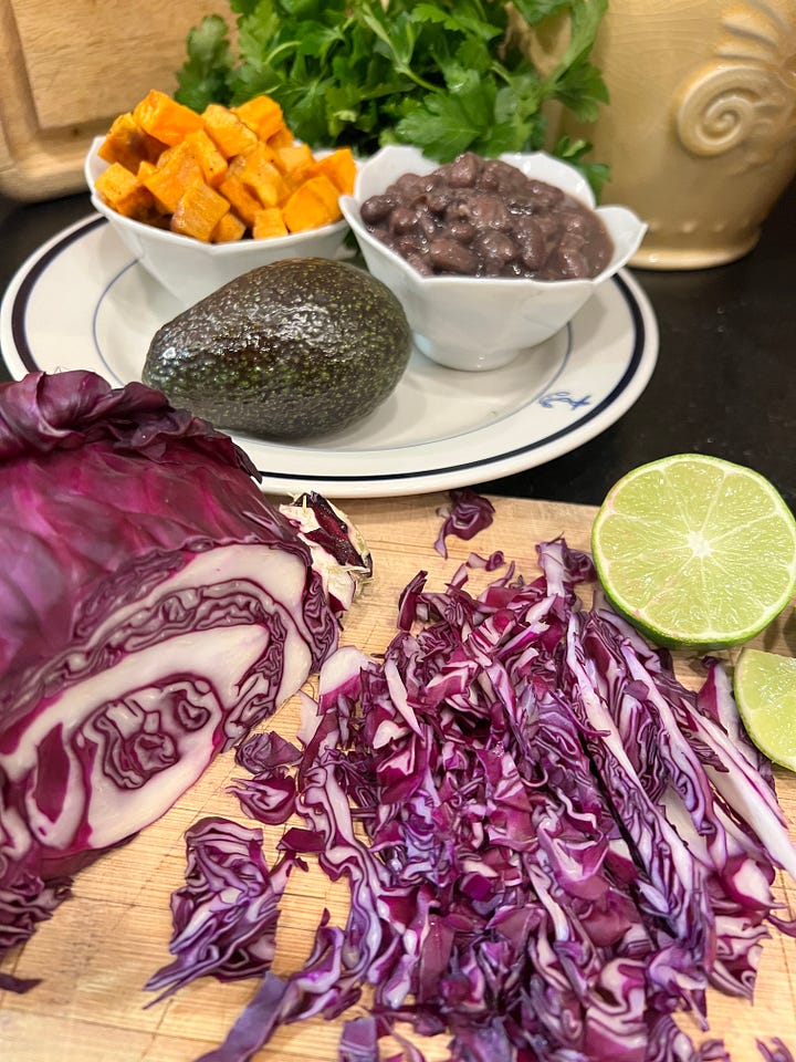 taco ingredients and tacos on a plate