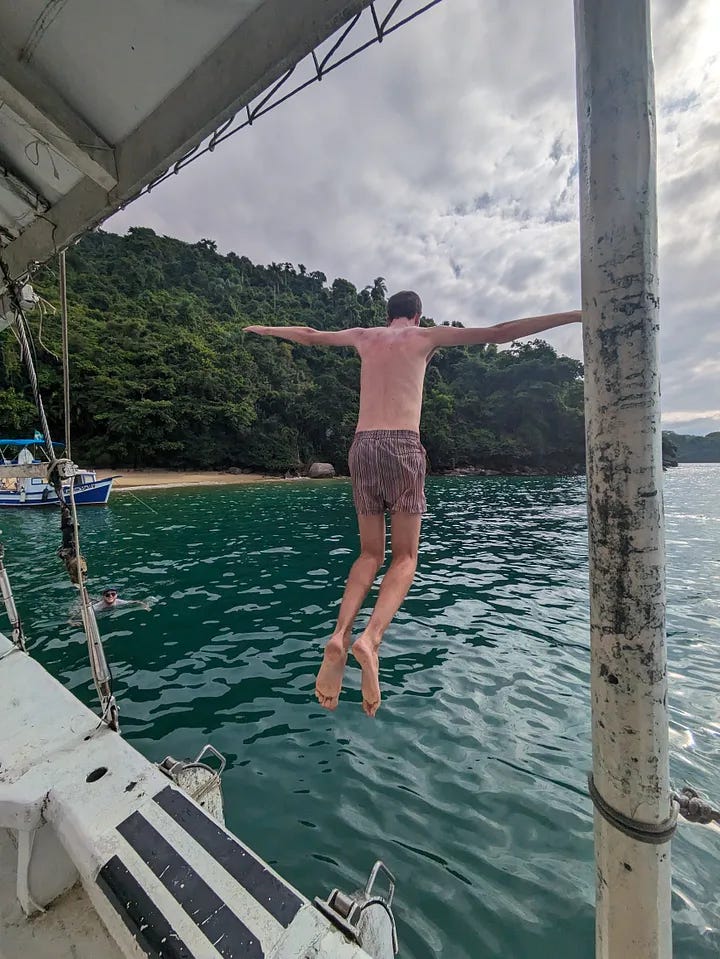 A photo of each traveler jumping into the water, followed by all three of them smiling and toasting beers with the water in the background