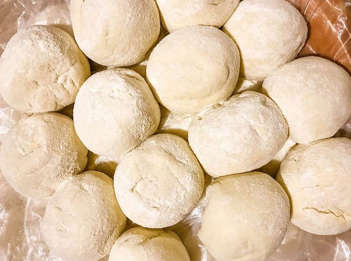 rolling dough balls for pane carasau