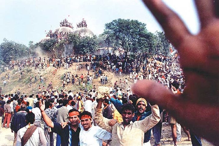 Mobs climb on top of Babri masjid, 6 December, 1992.