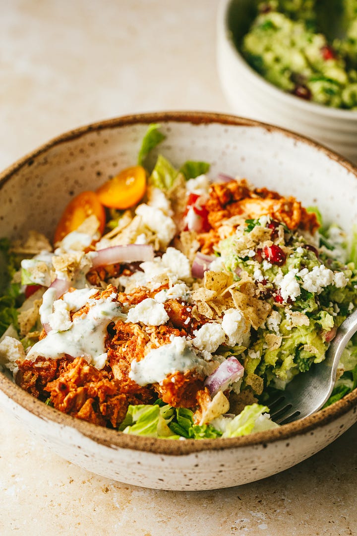 Pomegranate guacamole and chicken tinga taco salad.