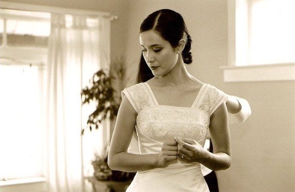 Black and white photos of a bride on her wedding day