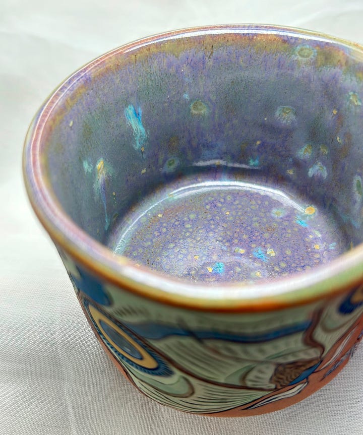 Four images showing the cool glaze effects I got inside this batch of mugs!