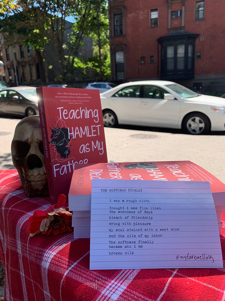 writing poetry and signing books in a park in New York City