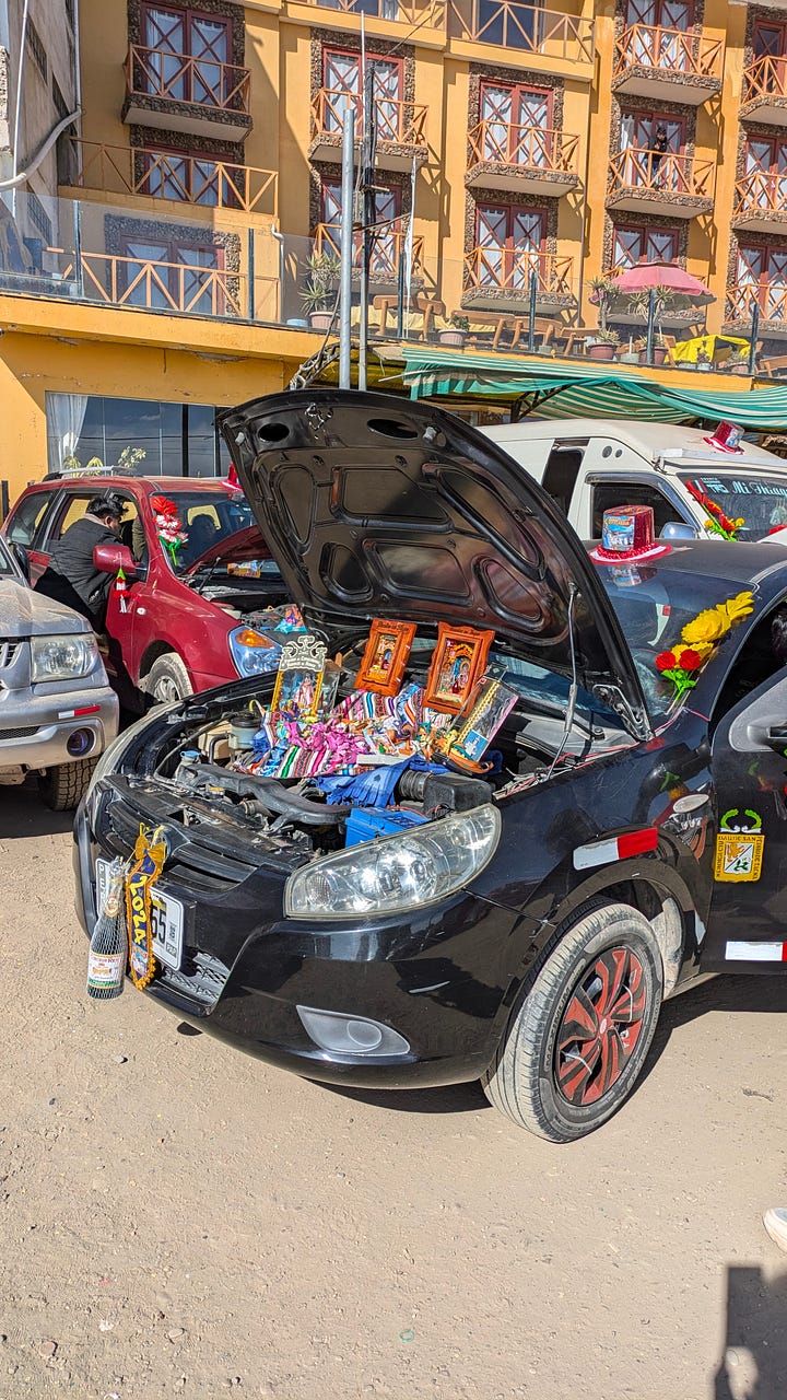 Families bring their cars to Copacabana in August for a blessing, which explains the national culture of overconfidence in driving