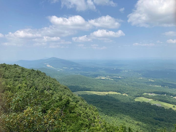 two contrasting vistas from overlooks, as described in the caption