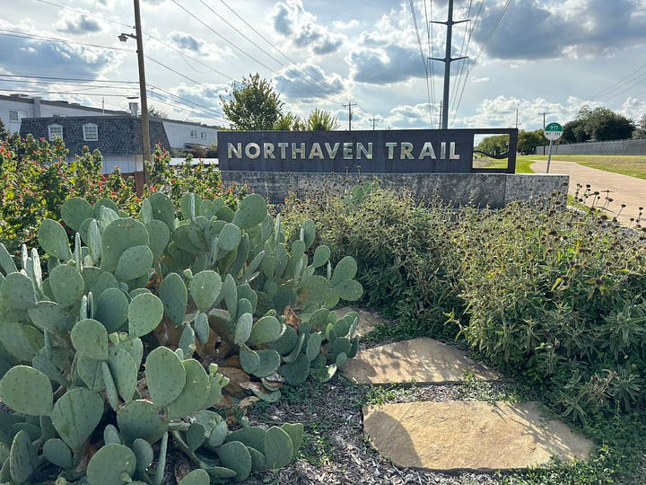 Northhaven trail sign and pedestrianized intersection.