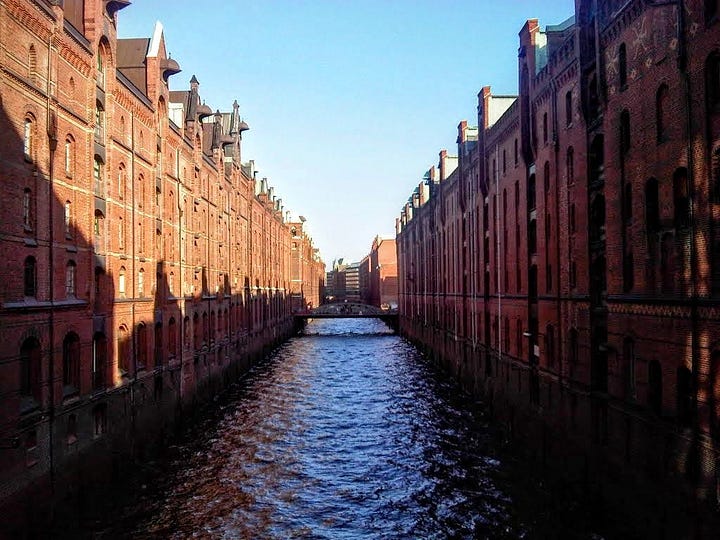 View of the Speciherstadt, Harmburg, and a glass of Pils