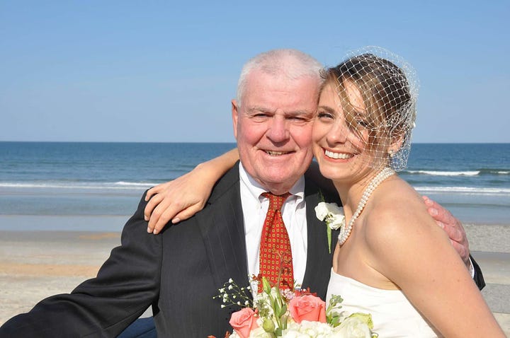 Susan Derry with her father in a rehearsal room. Susan Derry with her father on her wedding day.