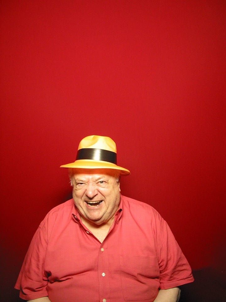 Peter writes a note while using a carphone sometime in the 1960s; Peter, wearing an orange plastic party fedora, laughs in a photo booth photo.