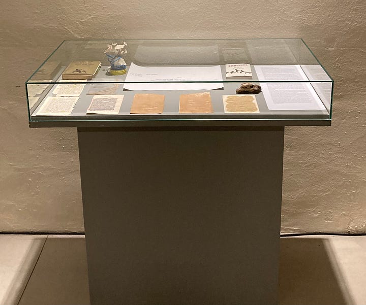 Two display cases with scent and visual poems