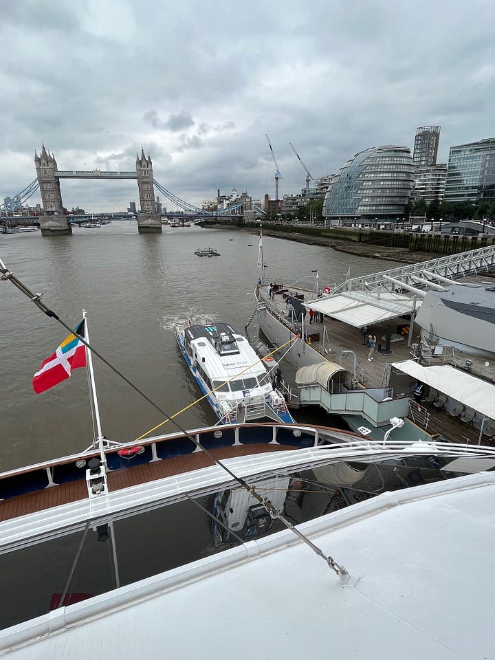 Four images of the Windstar Legend cruise yacht including one on the ocean, one on the deck and swimming pool and two with London's Tower Bridge in the background