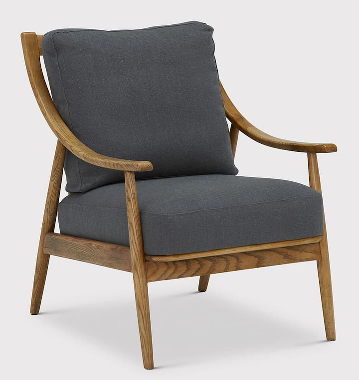 ercol inspired chair with spindle back in wood with grey cushions