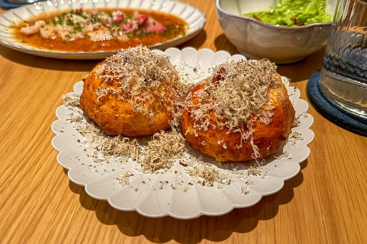 Gruyère gourgeres and the yellowtail with black truffle and horseradish