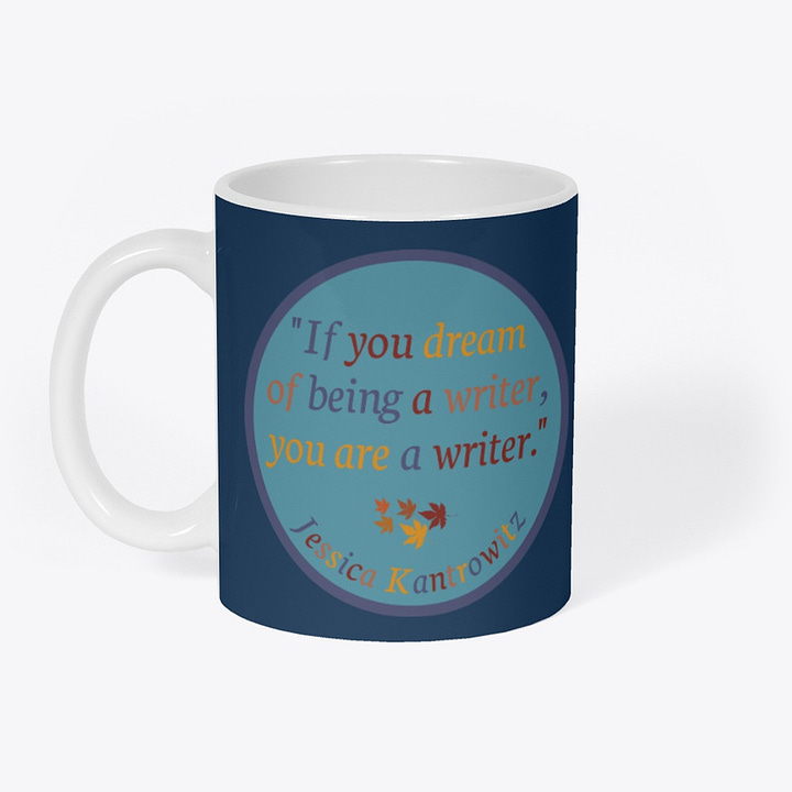 A mug and a sticker, both with a round, light blue graphic with blue, red, and orange text that reads, "If you dream of being a writer, you are a writer. Jessica Kantrowitz"