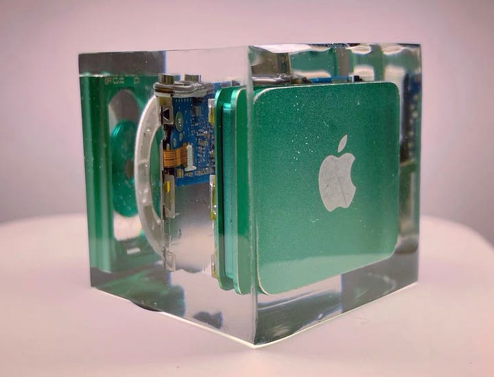 Design in Resin: A rare glimpse into Apple's prototype stages. The iPod shuffle's control pad suspended in time.