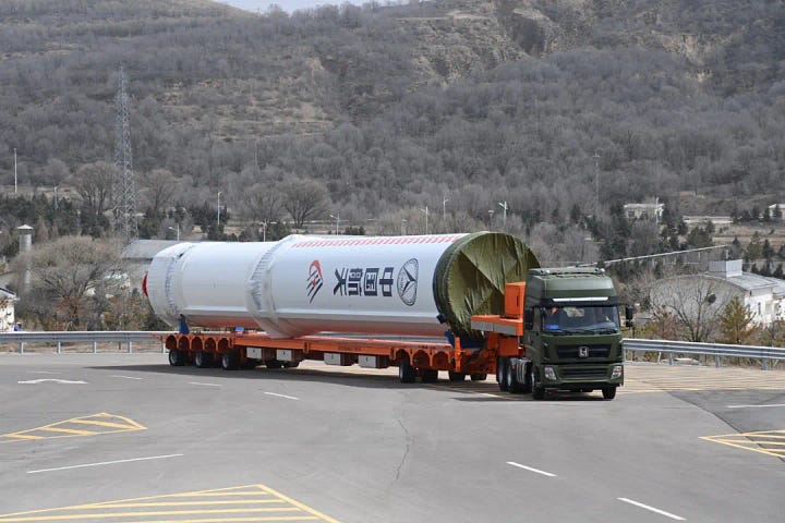 The Long March 6A's first-stage and fairing heading to the launch pad.