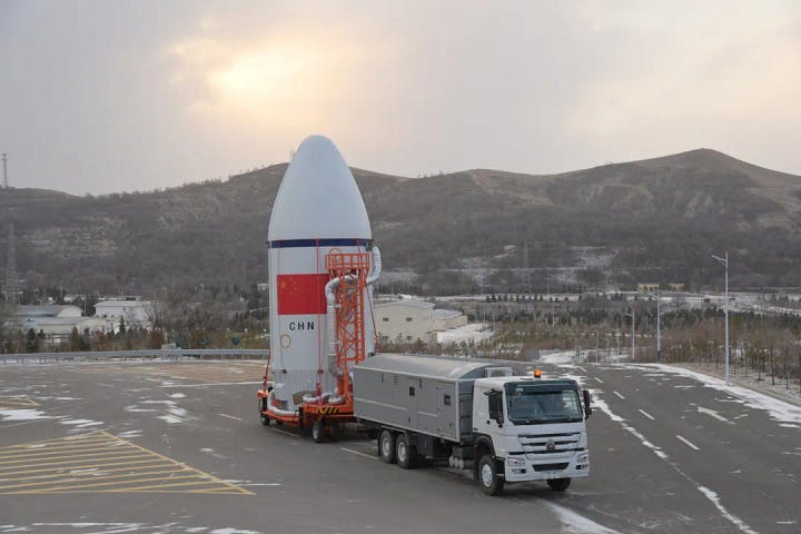 The Long March 6A's first-stage and fairing heading to the launch pad.