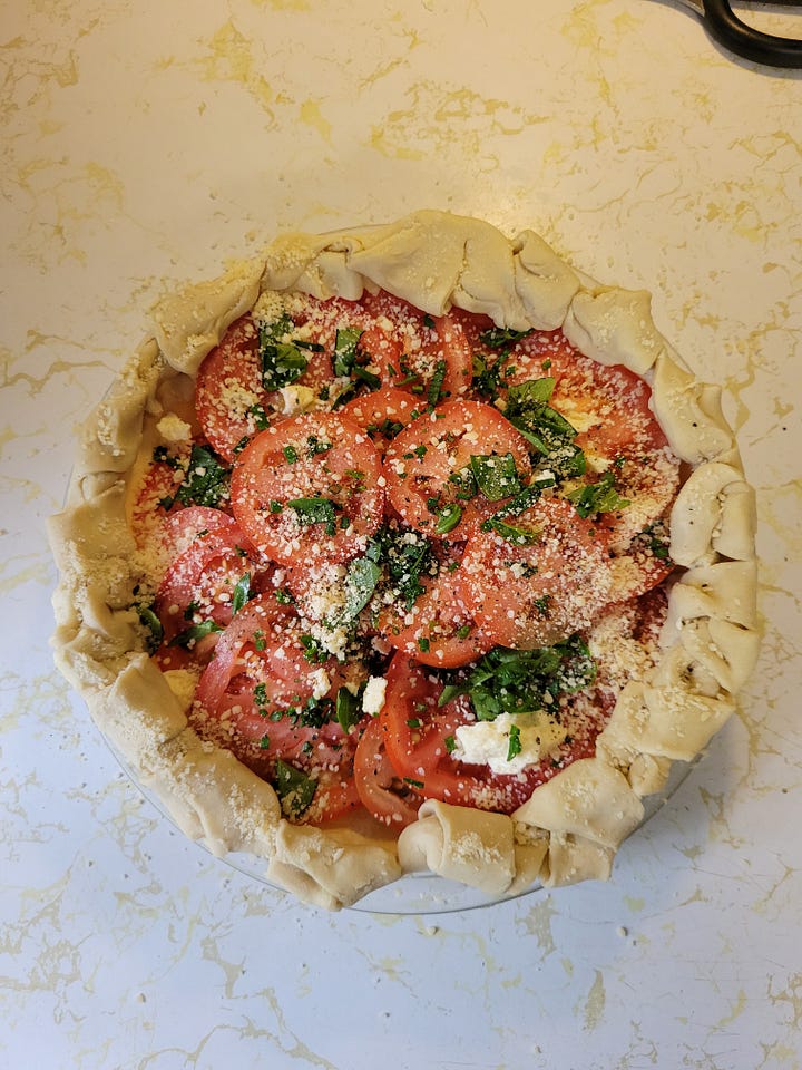 From rolling out the crust to baked tomato tart