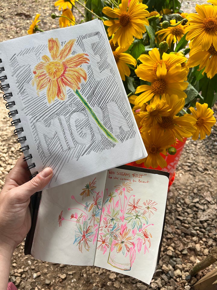 Mexican Sunflower is a bright yellow/orange color. Here, drawings of the flowers are photographed in front of the cut and arranged flowers.