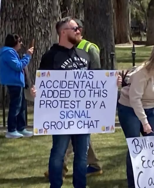 Funny signs at the Hands Off rallies.
