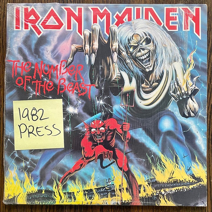 pictures of the album covers of Iron Maiden's The Number of the Beast with 1982 Press sticker and Morrissey's Viva Hate with 1988 Spanish Press sticker