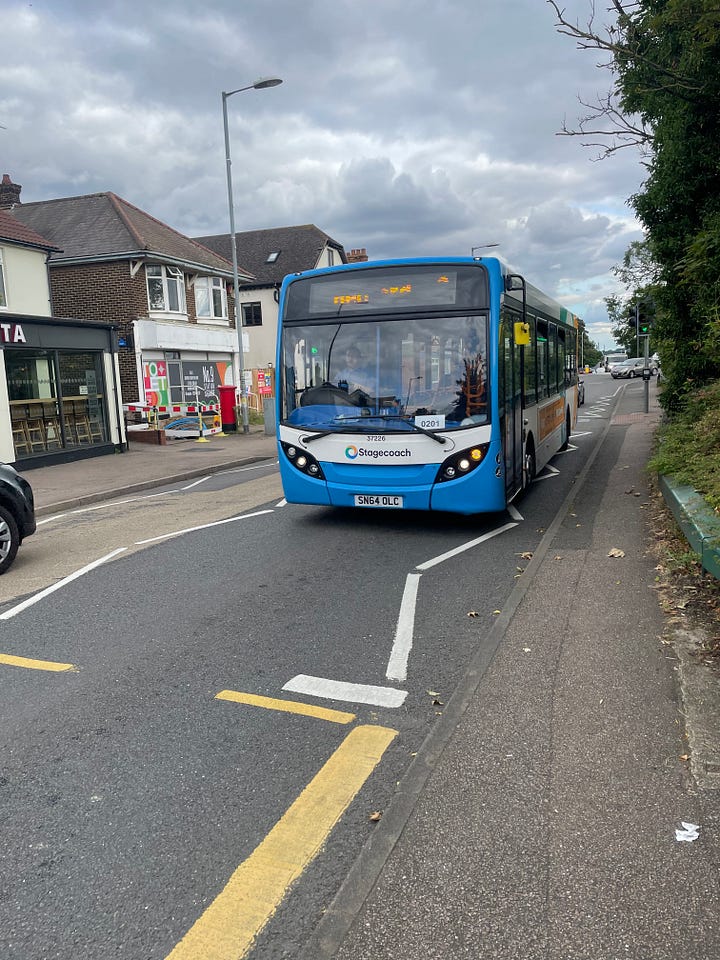 Two of the images show buses, one is blue with white stripes and the other is red. Two pictures show people sat on each bus