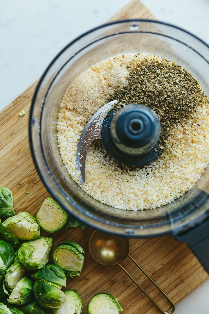 Seasoning mix for chicken parmesan tenders and everything on a sheet pan.