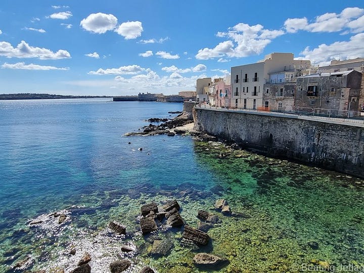 View from the ramparts and one street in Ortigia, Syracuse, italy