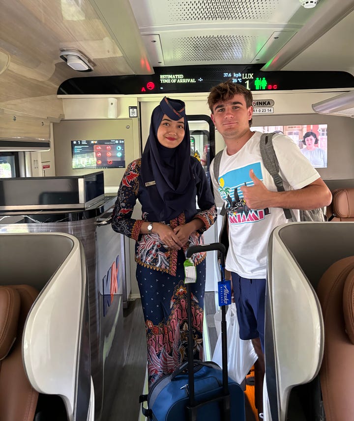 Train attendant in Eksekutif Lux class from Jakarta to Yogyakarta
