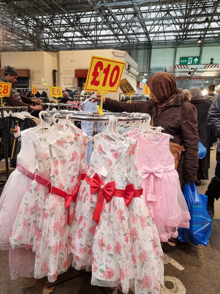 Clothing stalls Queens Market, East London