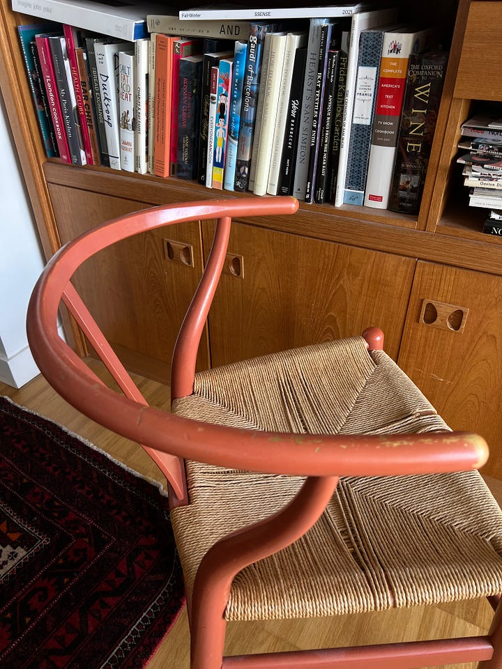 My wishbone chair. It's a beautiful terracotta colour that has developed a great patina over time. 