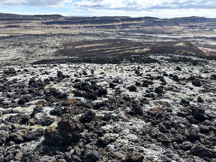 Myself and my son looking sleepy at Grábrók and the views climbing up the crater and across the lava fields.