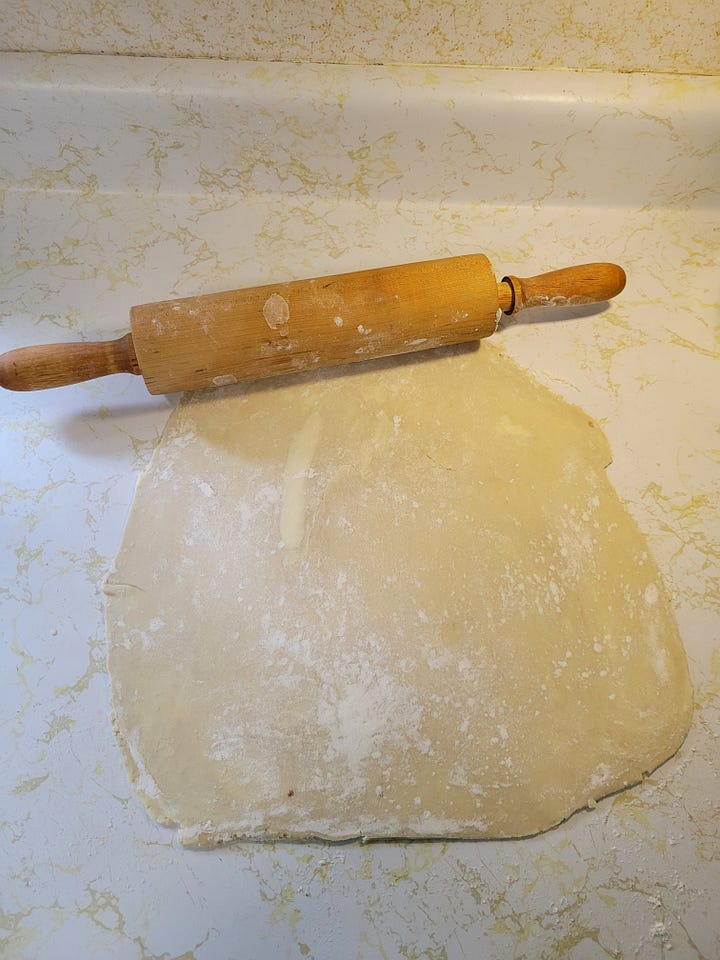 From rolling out the crust to baked tomato tart