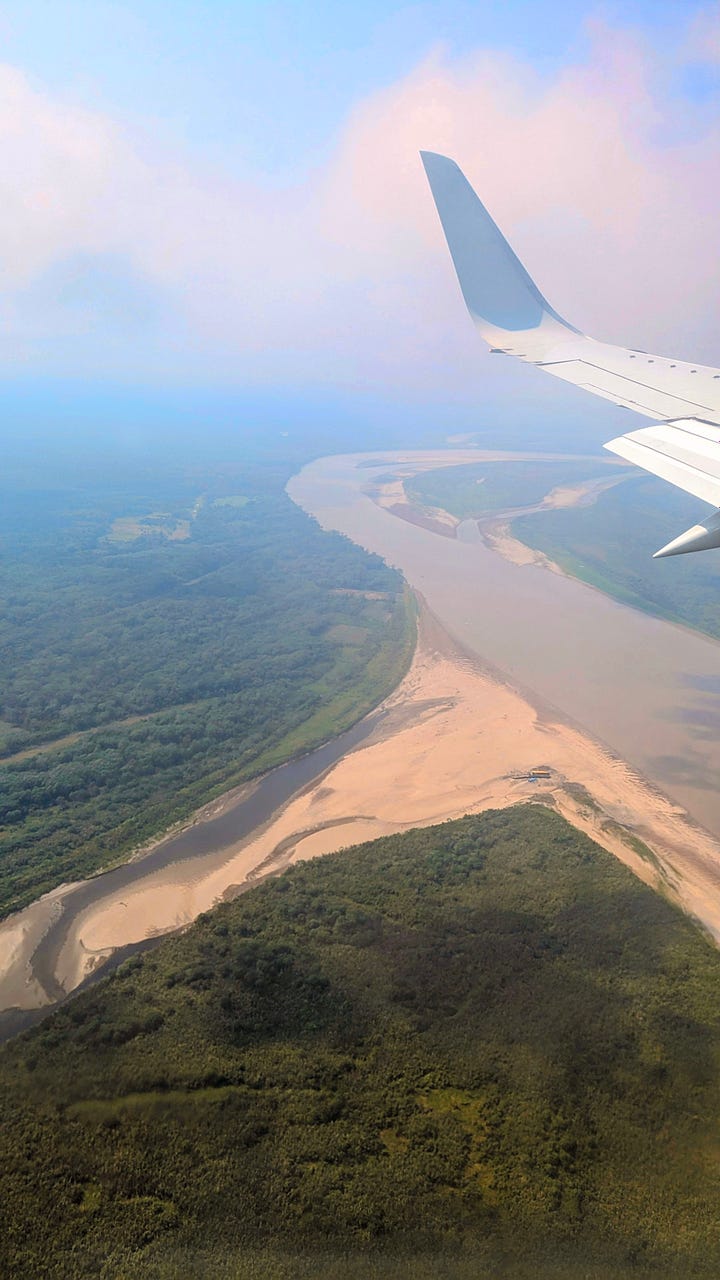 From Iquitos to Lima – views of the Amazon river (left) quickly replaced by mad desert scenery (right)