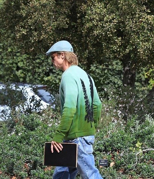 Brad Pitt chunky sweaters. Colorful sweaters.