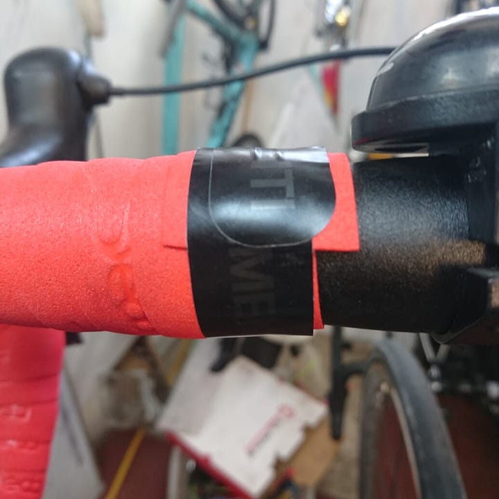 Red bar tape has a bad start at the bottom of the bar, and a poor finish at the end