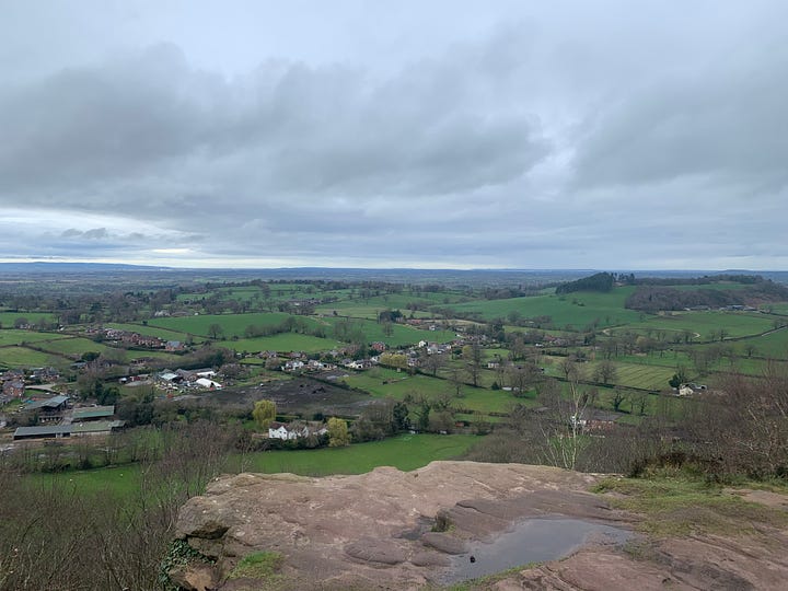 Two photos from a viewpoint looking across Cheshire farmland
