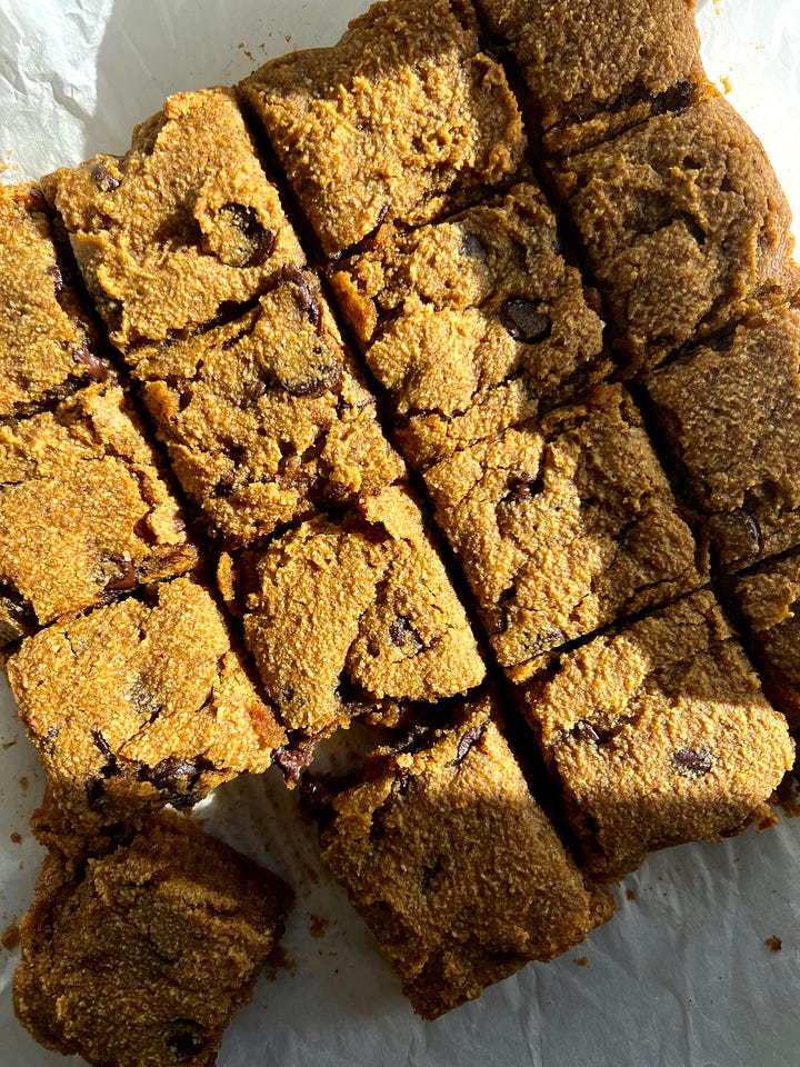 Pumpkin blondie batter in baking dish next to image of sliced pumpkin blondies.