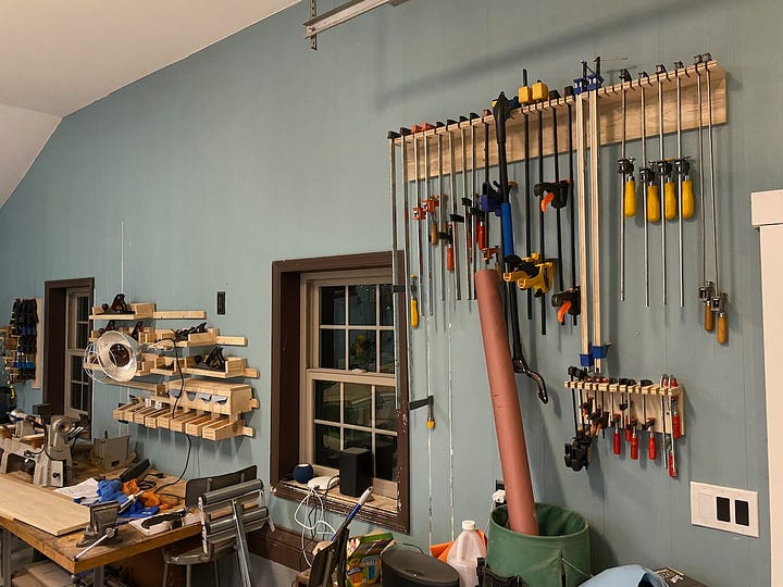 Wall-mounted clamp racks.