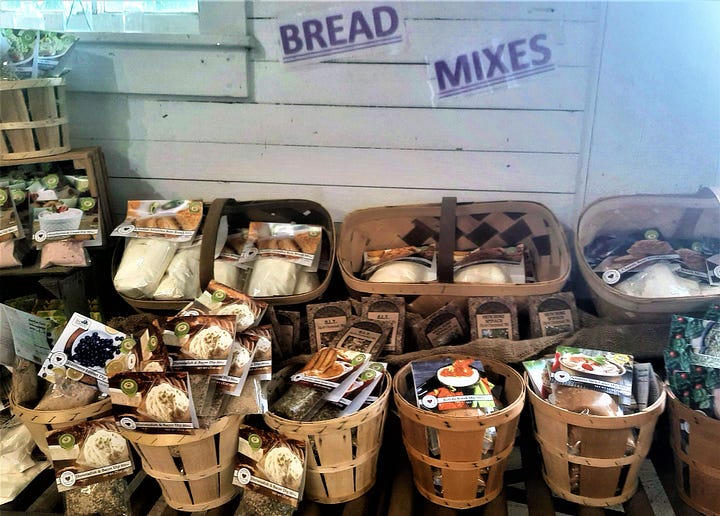 Pictures of different items for sale at the Round Barn including coffee, breads and mizes.