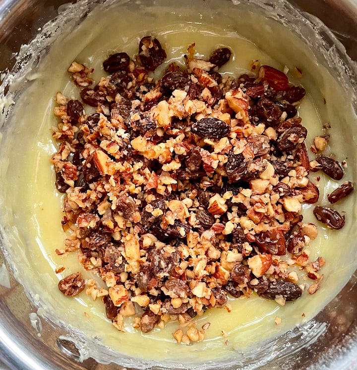 sugar, egg yolk, and sour cream; cooked filling with nuts and yuck raisins